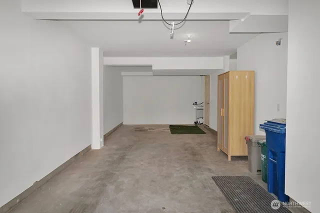 a view of a storage & utility room with a sink