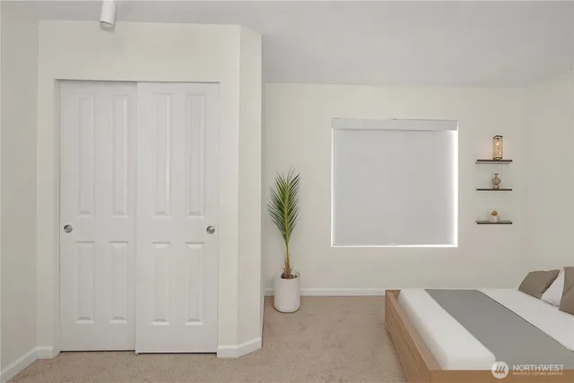 a view of an empty room and window