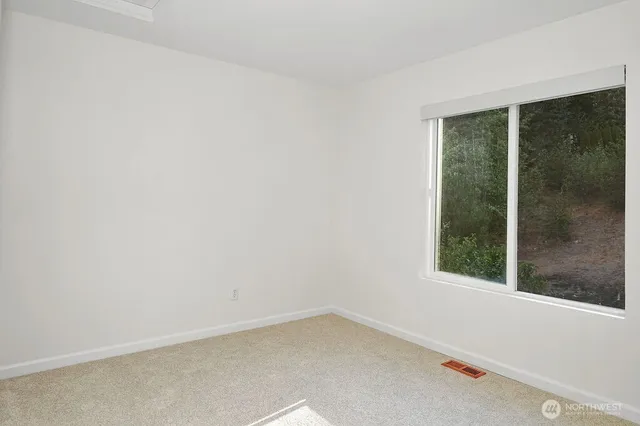 an empty room with window