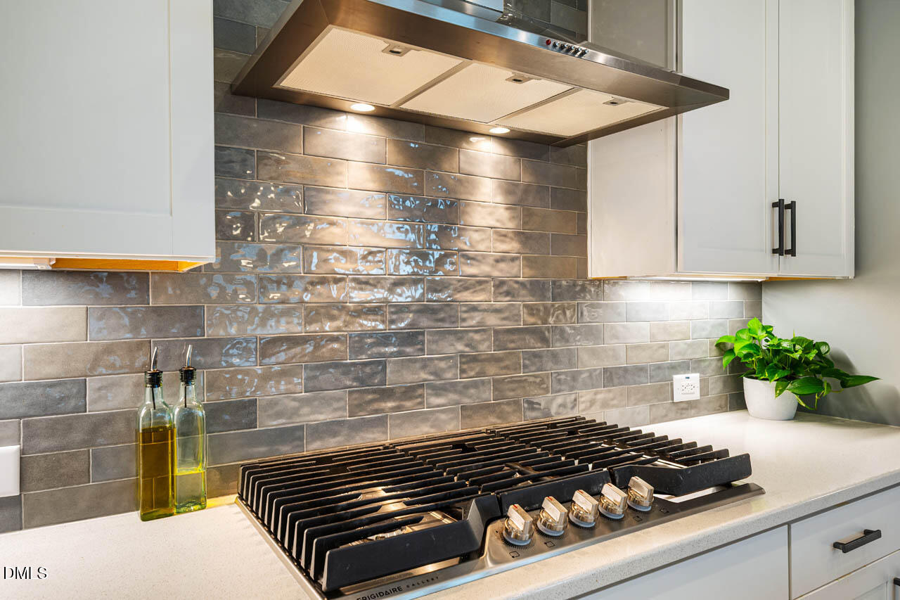 112 Imagine Way Pittsboro, NC 27312 - Photo 13 of 42 Gas Cooktop & Tile Backsplash