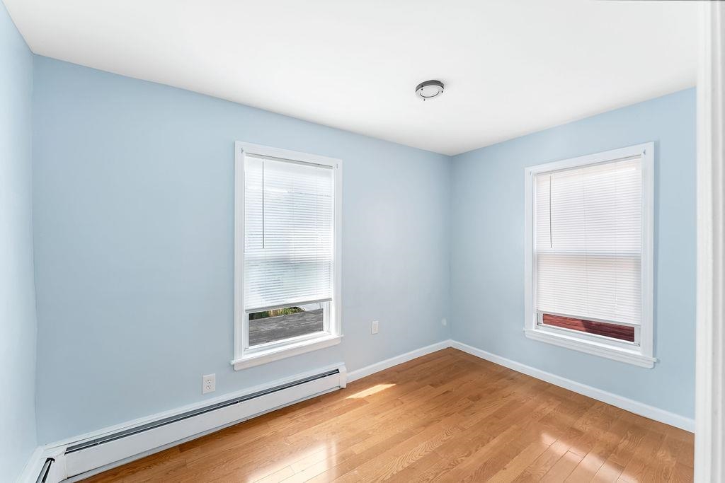 693 Chestnut Street, Unit 2 Kearny, NJ 07032 - Photo 14 of 19 a view of empty room with window