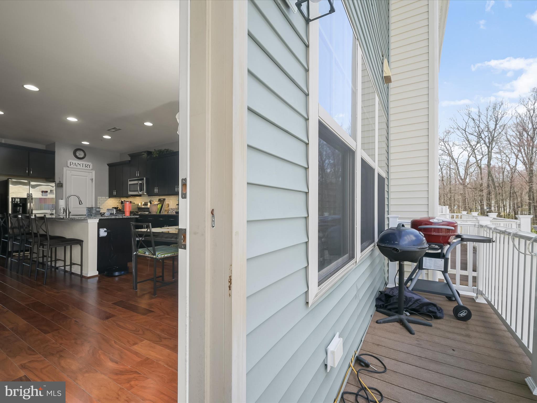 1117 Red Hawk Way Severn, MD 21144 - Photo 15 of 39 a view of a chairs and table in the balcony