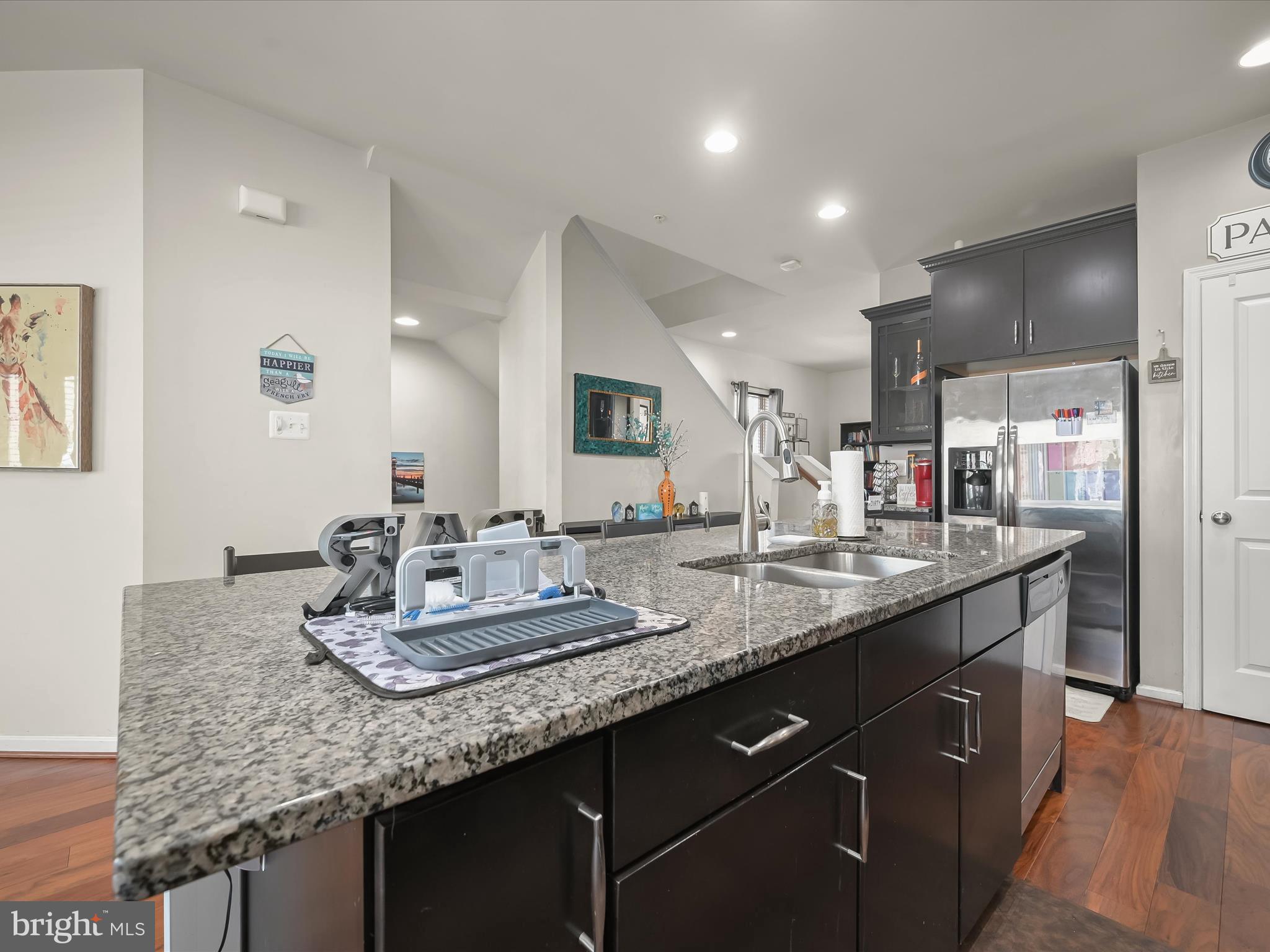 1117 Red Hawk Way Severn, MD 21144 - Photo 17 of 39 a bathroom with a granite countertop sink and a mirror