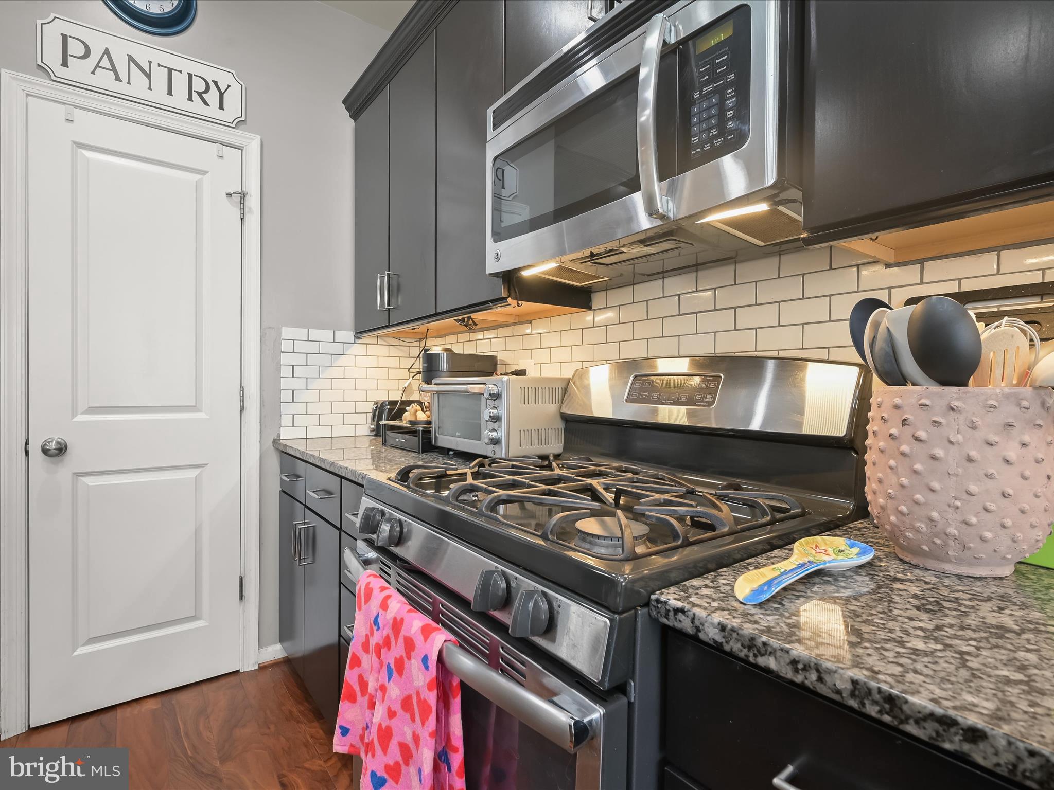 1117 Red Hawk Way Severn, MD 21144 - Photo 18 of 39 a stove top oven sitting inside of a kitchen