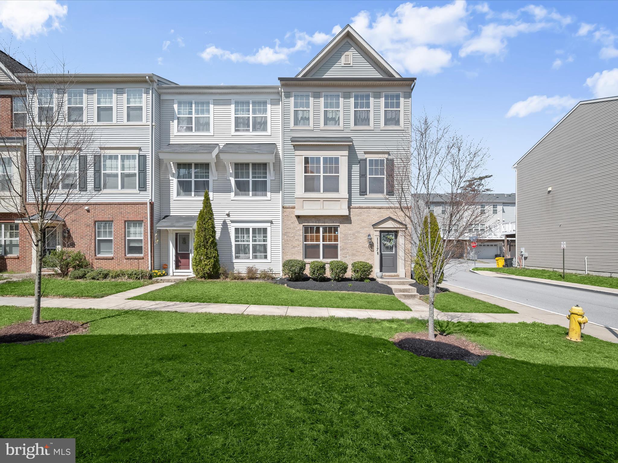 1117 Red Hawk Way Severn, MD 21144 - Photo 2 of 39 a front view of a house with a yard
