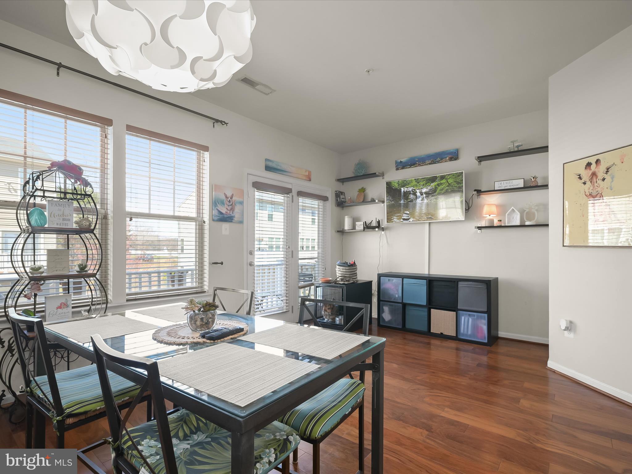1117 Red Hawk Way Severn, MD 21144 - Photo 21 of 39 a view of a dining room with furniture window and wooden floor