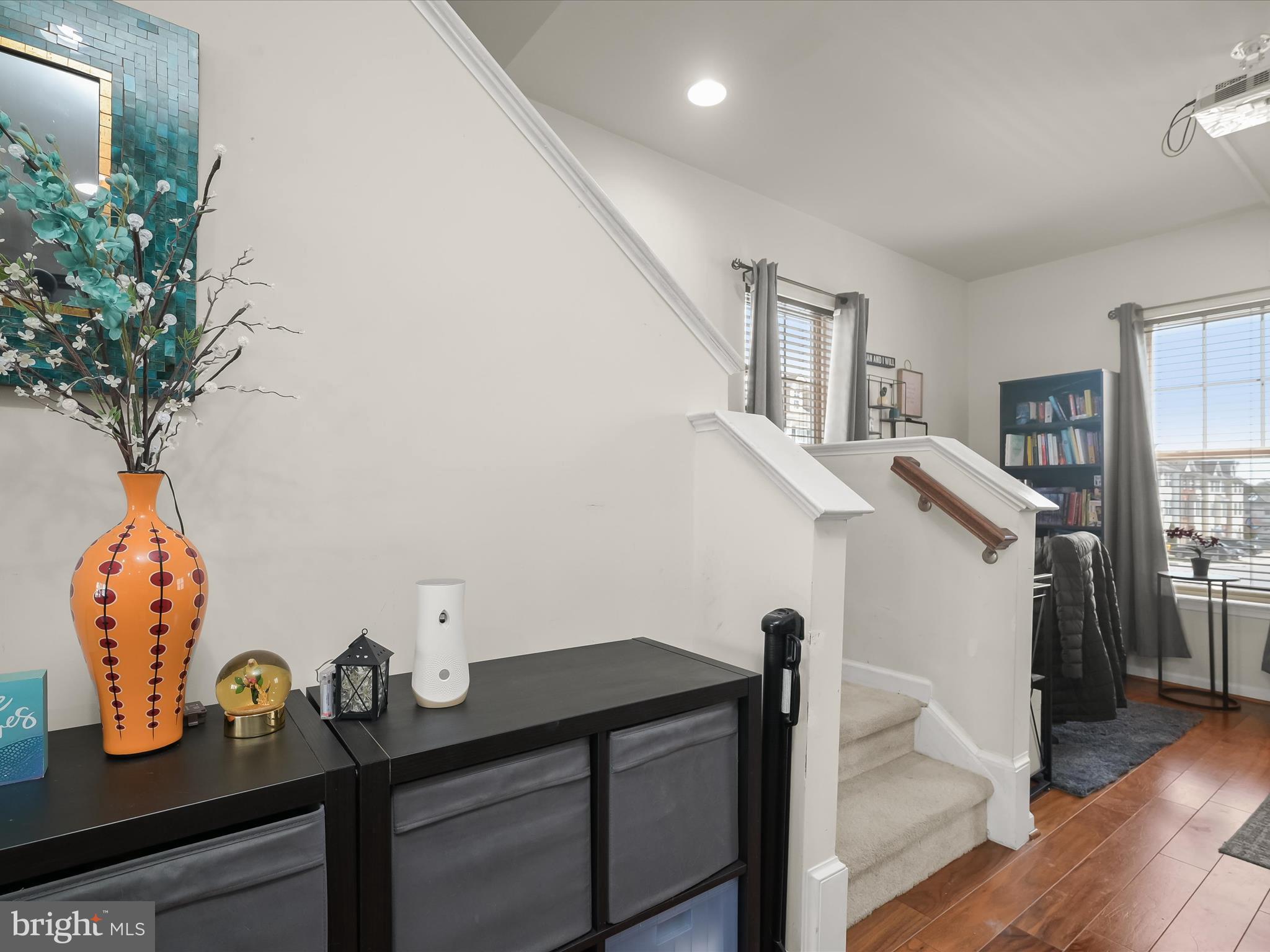 1117 Red Hawk Way Severn, MD 21144 - Photo 22 of 39 a view of entryway with livingroom and chandelier