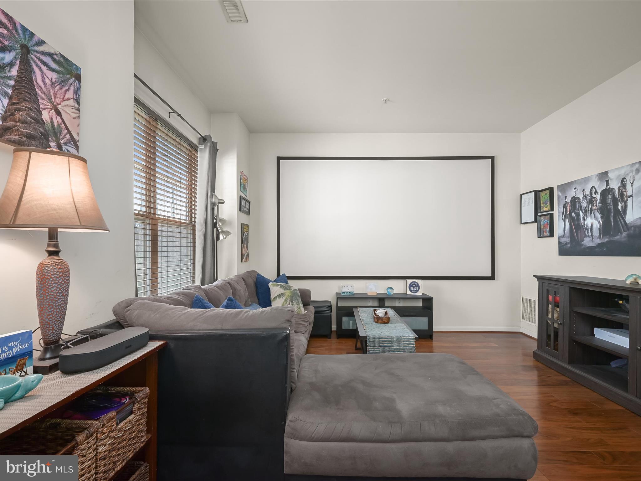 1117 Red Hawk Way Severn, MD 21144 - Photo 25 of 39 a living room with furniture and a flat screen tv