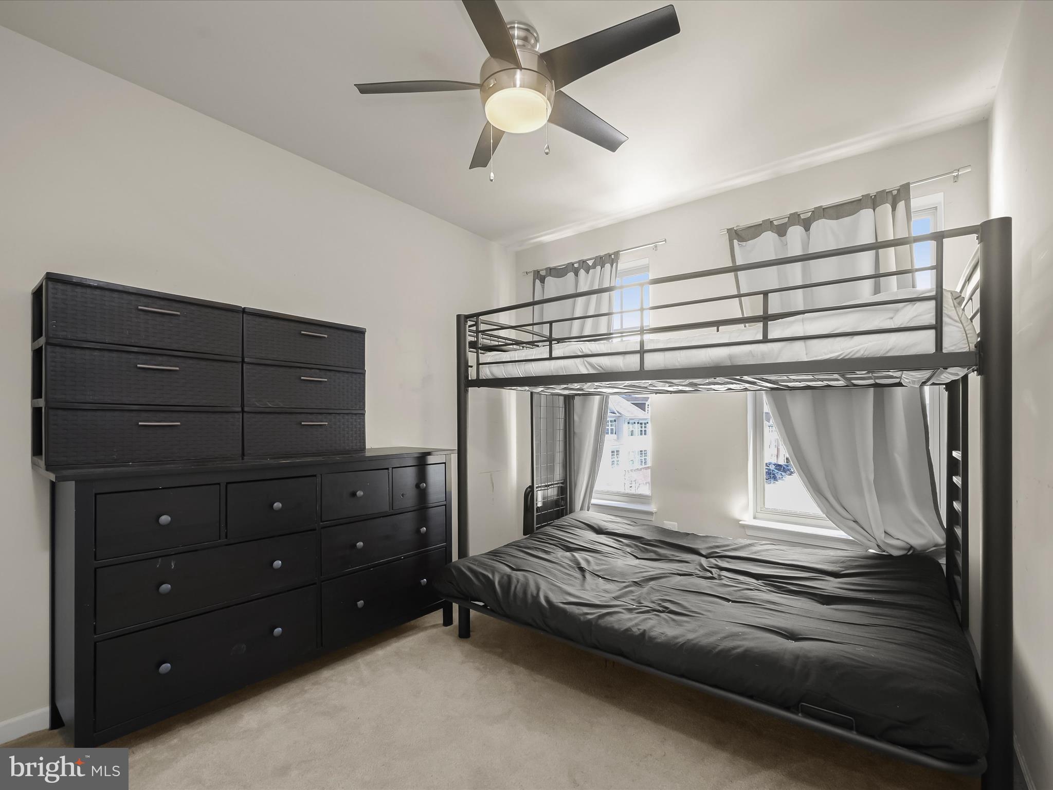 1117 Red Hawk Way Severn, MD 21144 - Photo 35 of 39 a bedroom with a bed and a ceiling fan