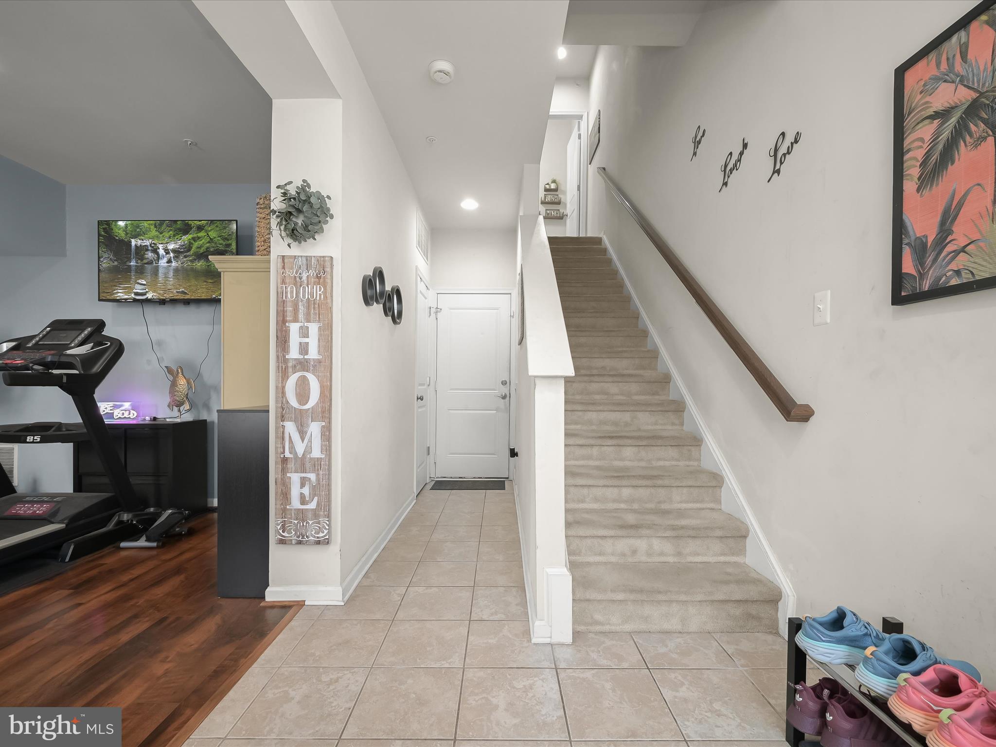 1117 Red Hawk Way Severn, MD 21144 - Photo 7 of 39 a view of entryway and hall with wooden floor
