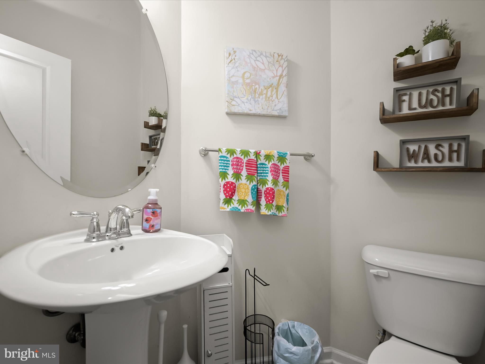 1117 Red Hawk Way Severn, MD 21144 - Photo 8 of 39 a bathroom with a sink mirror and toilet