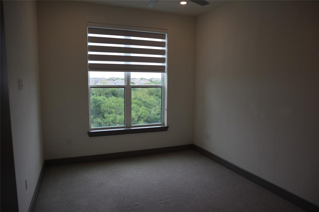 2700 Old Denton Road, Unit 3314 Carrollton, TX 75007 - Photo 7 of 14 a view of an empty room with a window
