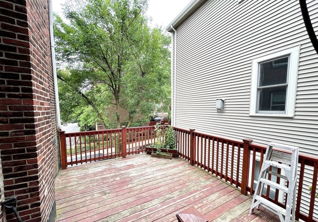 92 L Street, Unit 2 Boston, MA 02127 - Photo 14 of 15 a view of a wooden deck