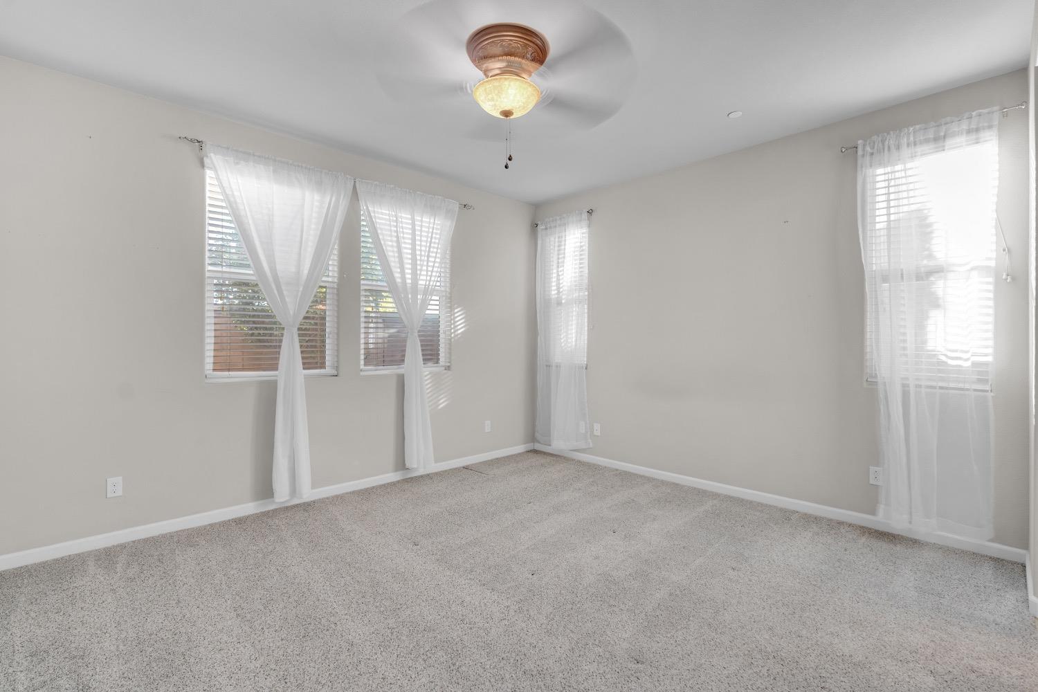 3532 Journey Way Clovis, CA 93619 - Photo 13 of 24 a view of an empty room with a window