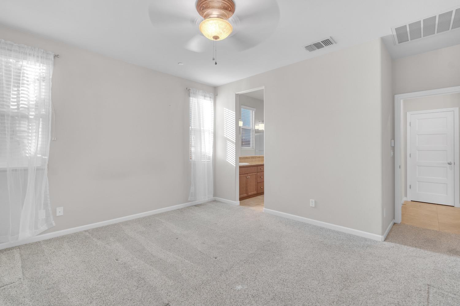 3532 Journey Way Clovis, CA 93619 - Photo 14 of 24 a view of an empty room with a window