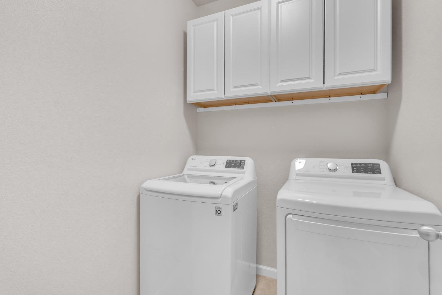 3532 Journey Way Clovis, CA 93619 - Photo 18 of 24 a utility room with dryer and washer