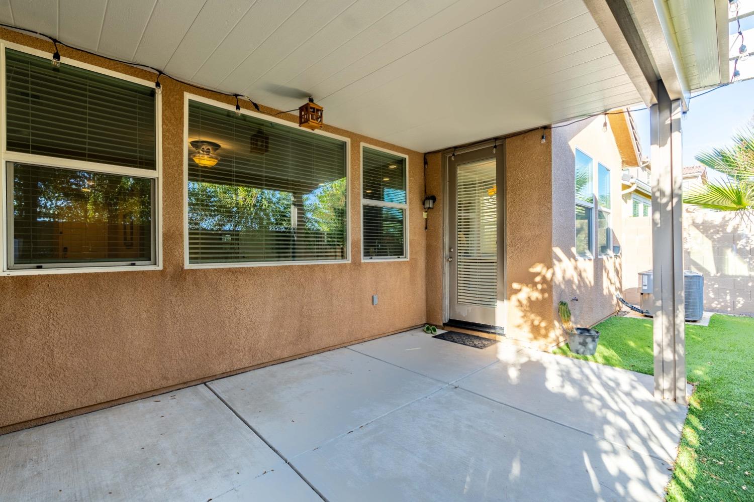 3532 Journey Way Clovis, CA 93619 - Photo 19 of 24 an empty room with wooden floor and windows