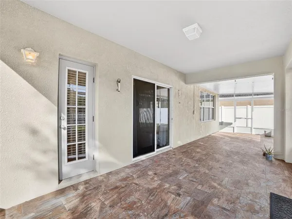 a view of empty room with windows