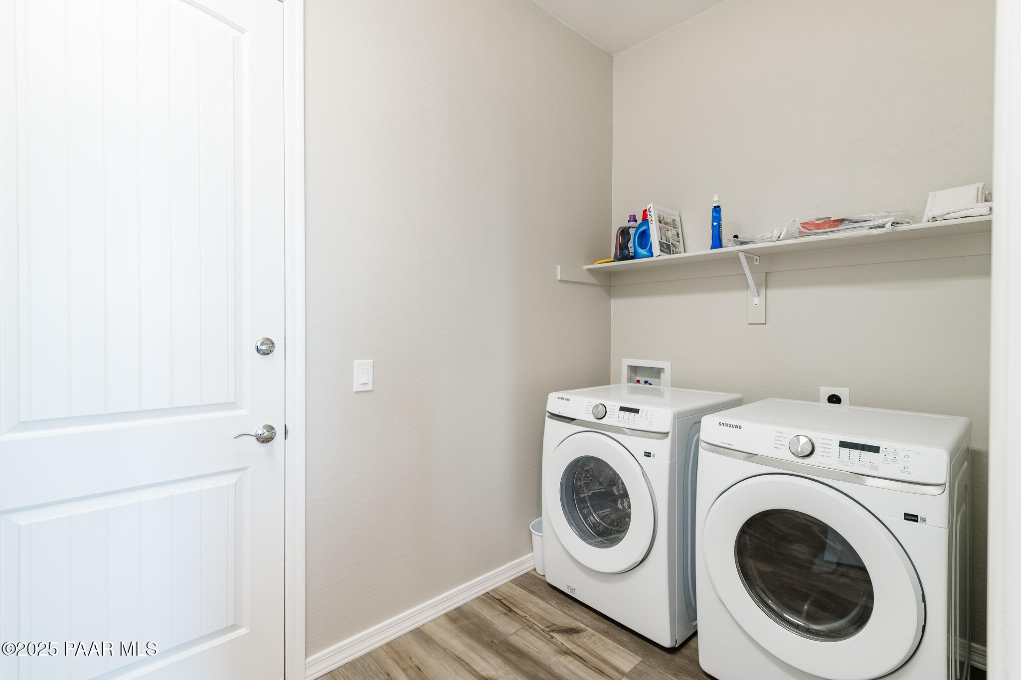 7091 Turquoise Street Prescott, AZ 86305 - Photo 11 of 27 a utility room with dryer and washer