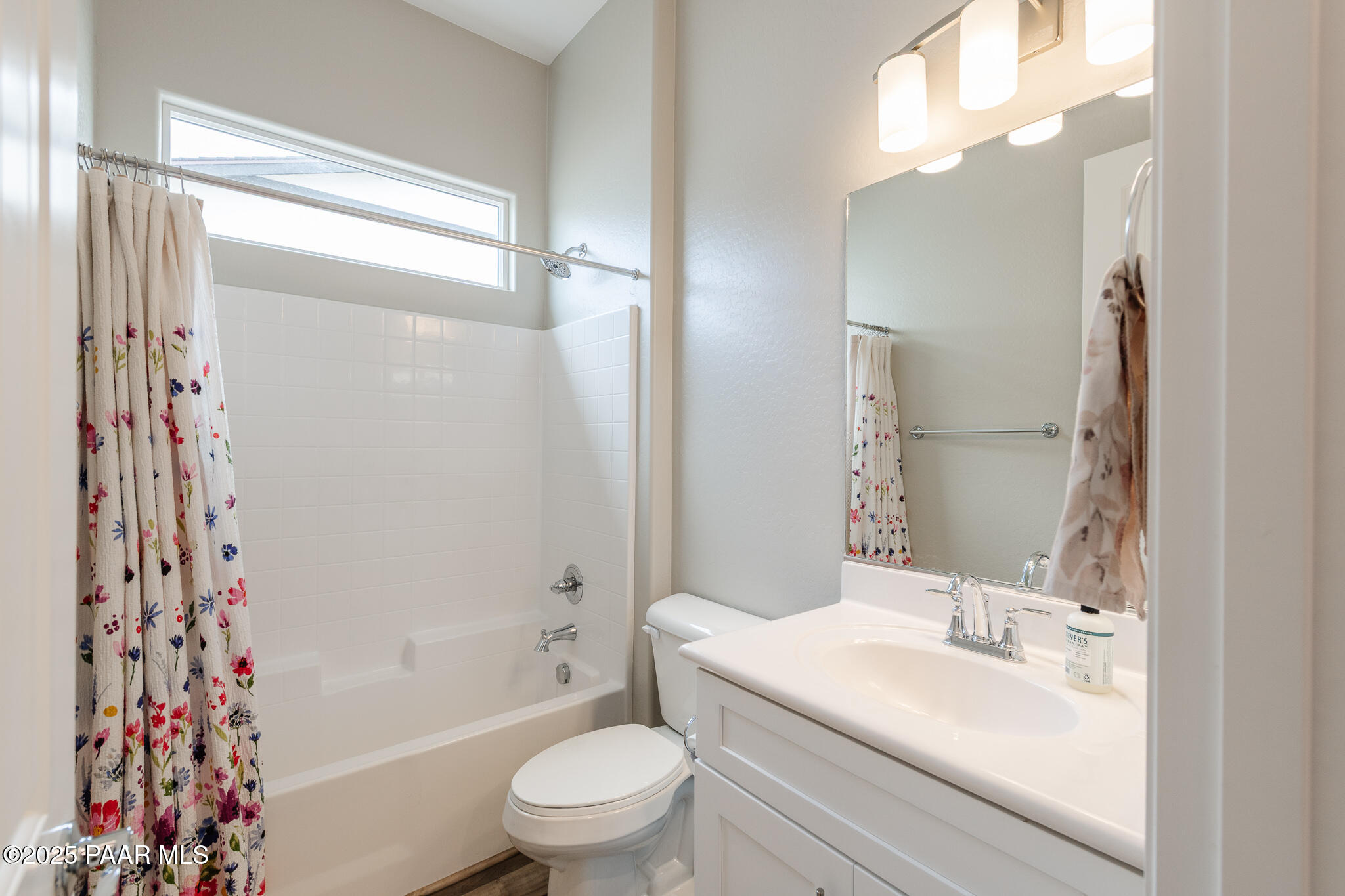7091 Turquoise Street Prescott, AZ 86305 - Photo 13 of 27 a bathroom with a sink a toilet and shower