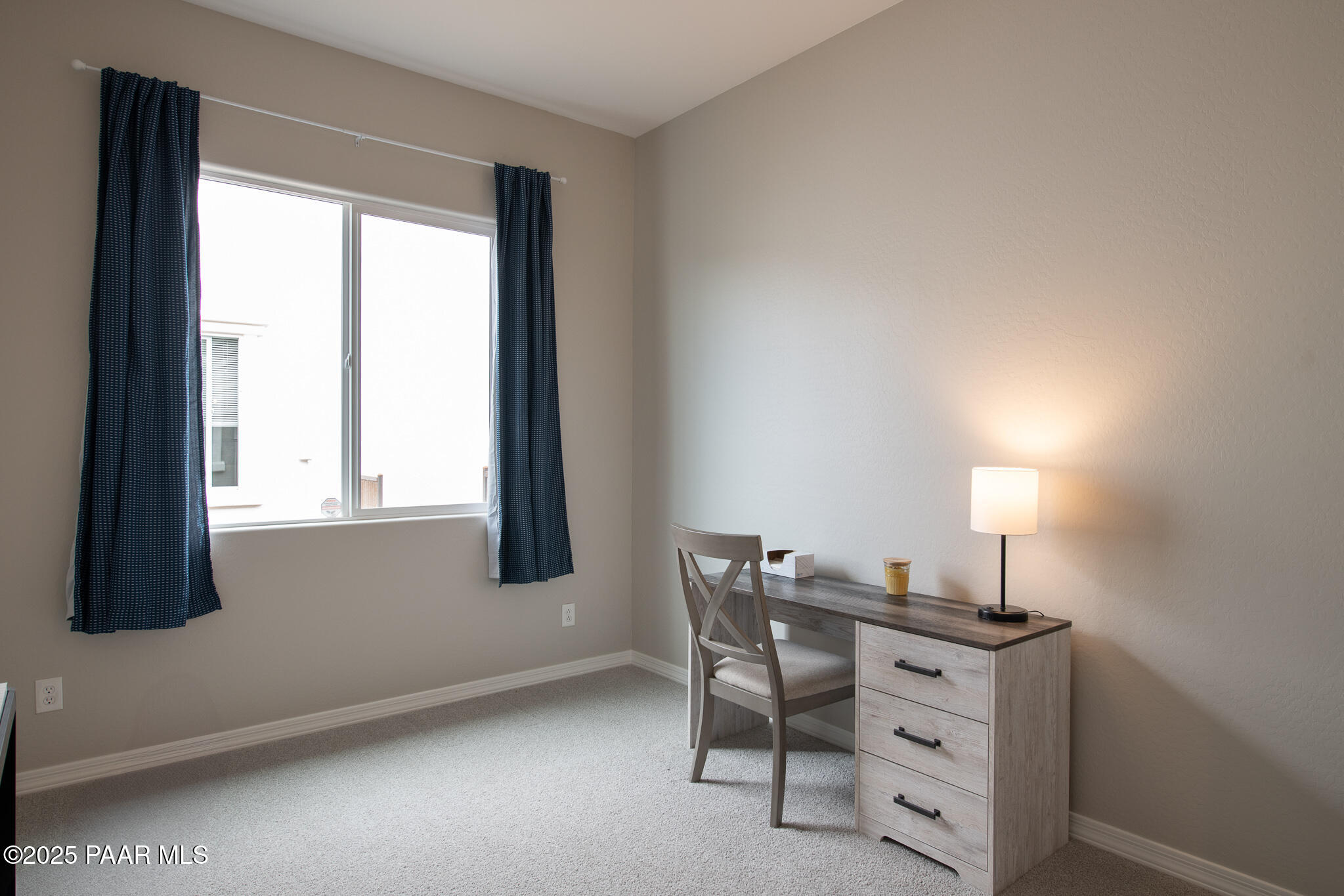 7091 Turquoise Street Prescott, AZ 86305 - Photo 14 of 27 a room with furniture and a window