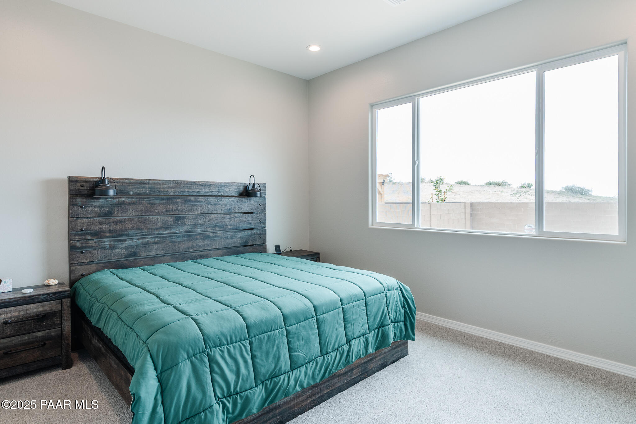 7091 Turquoise Street Prescott, AZ 86305 - Photo 15 of 27 a bedroom with a bed and window