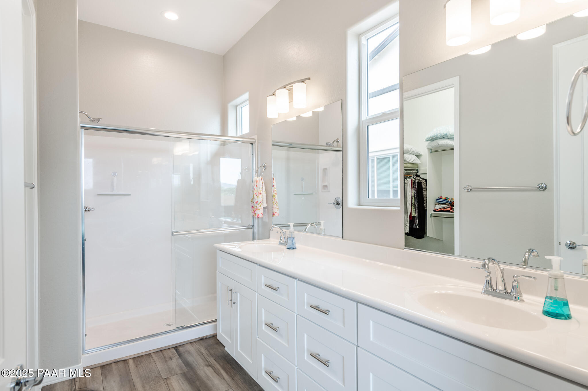 7091 Turquoise Street Prescott, AZ 86305 - Photo 17 of 27 a bathroom with a double vanity sink mirror and double