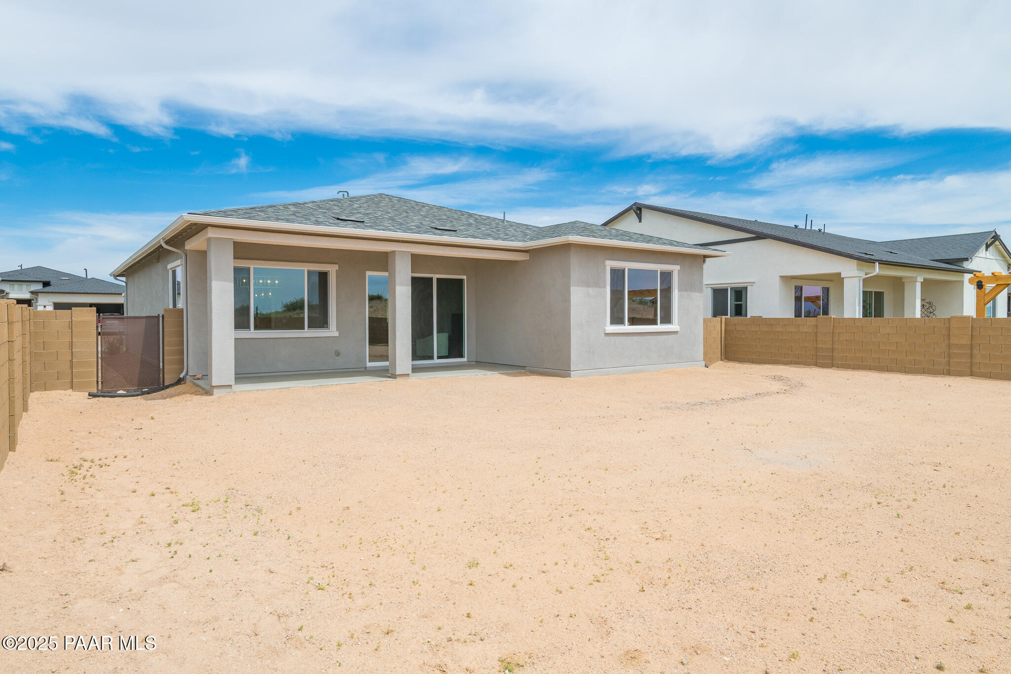 7091 Turquoise Street Prescott, AZ 86305 - Photo 24 of 27 a view of a house with a yard