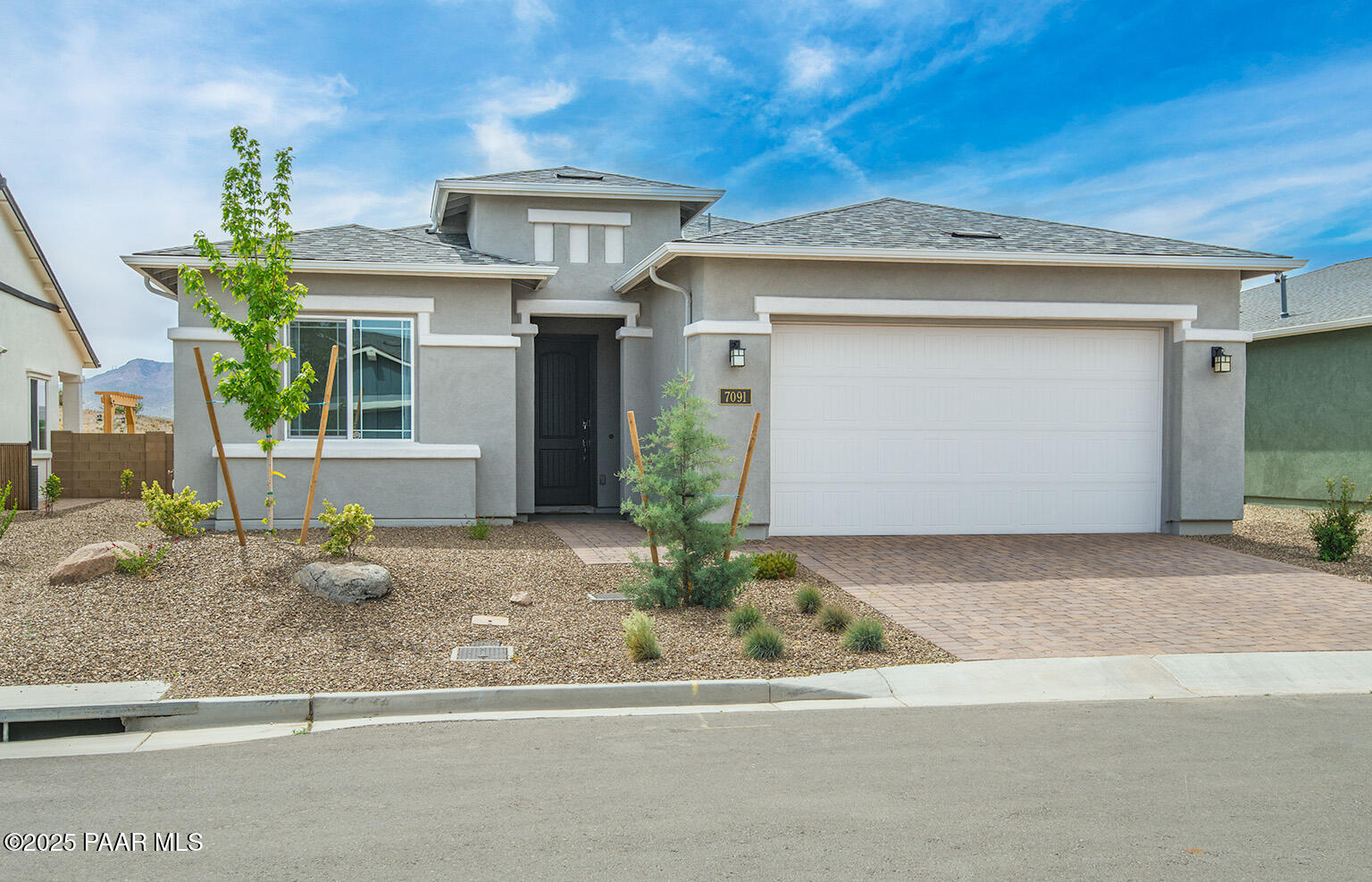7091 Turquoise Street Prescott, AZ 86305 - Photo 25 of 27 a front view of a house with garden