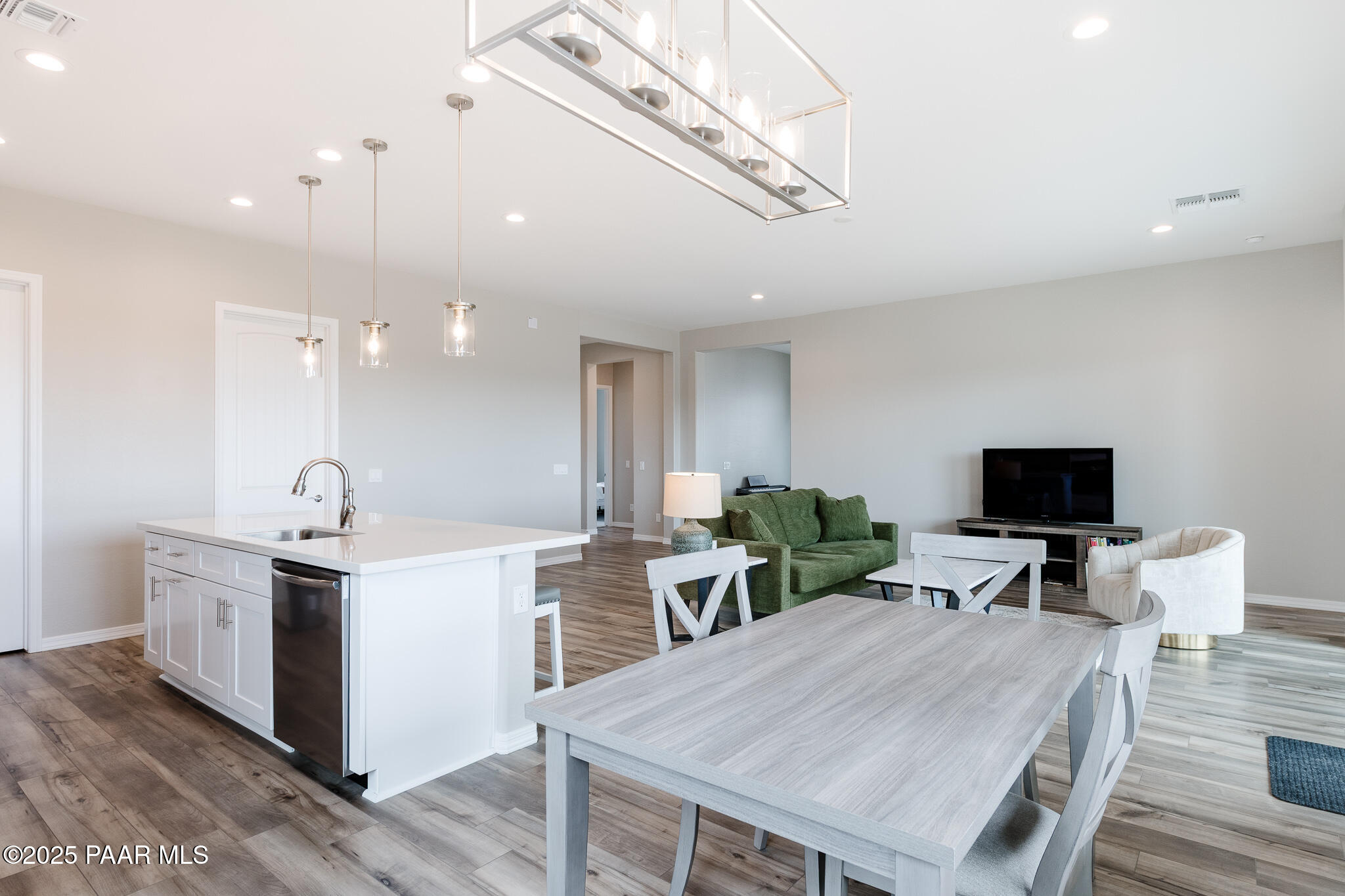 7091 Turquoise Street Prescott, AZ 86305 - Photo 6 of 27 a view of kitchen with sink microwave and dining table
