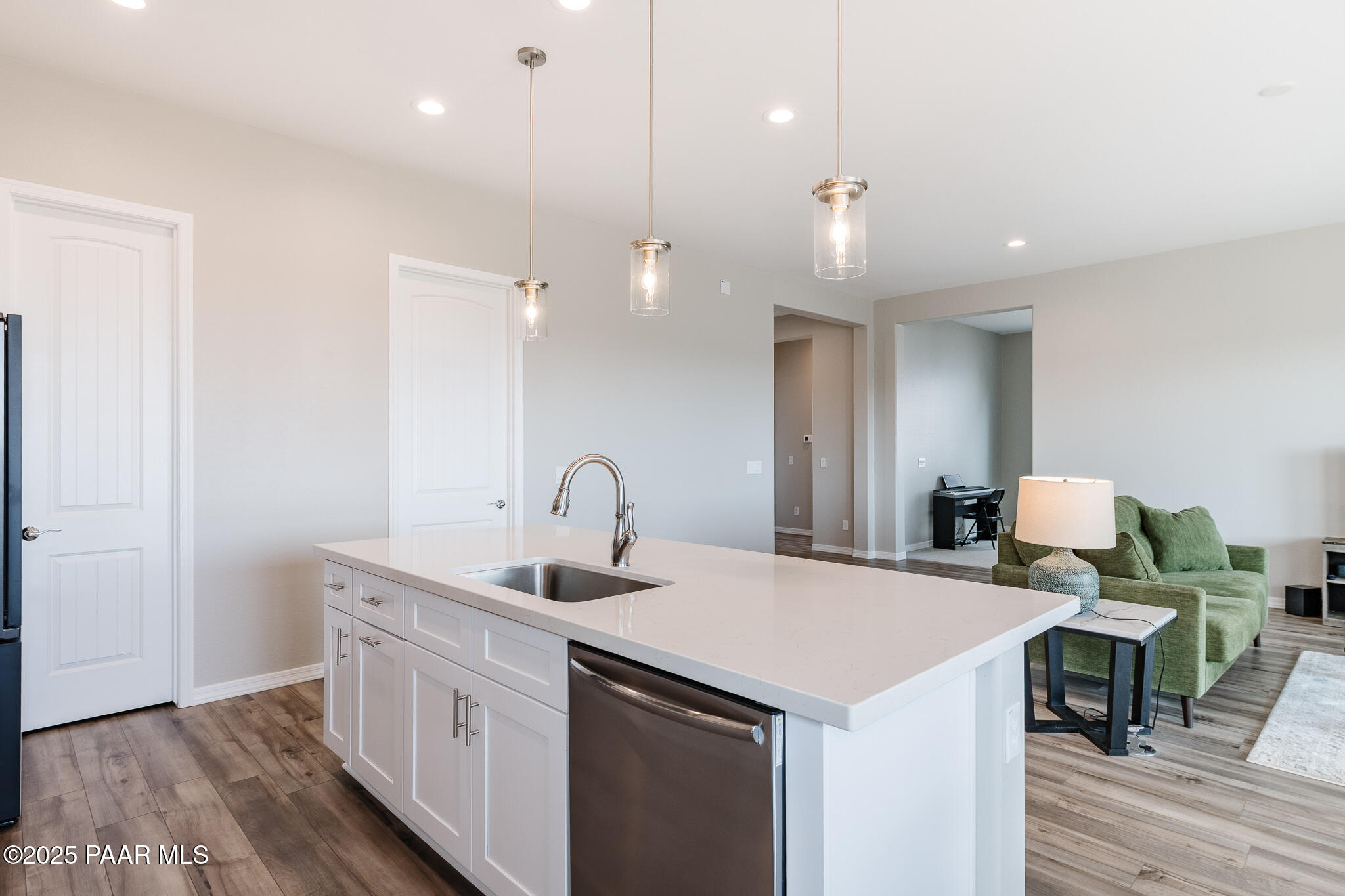 7091 Turquoise Street Prescott, AZ 86305 - Photo 7 of 27 a kitchen with a sink and a refrigerator