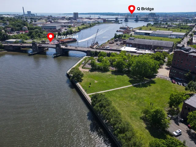 a view of a cars park in front of a building