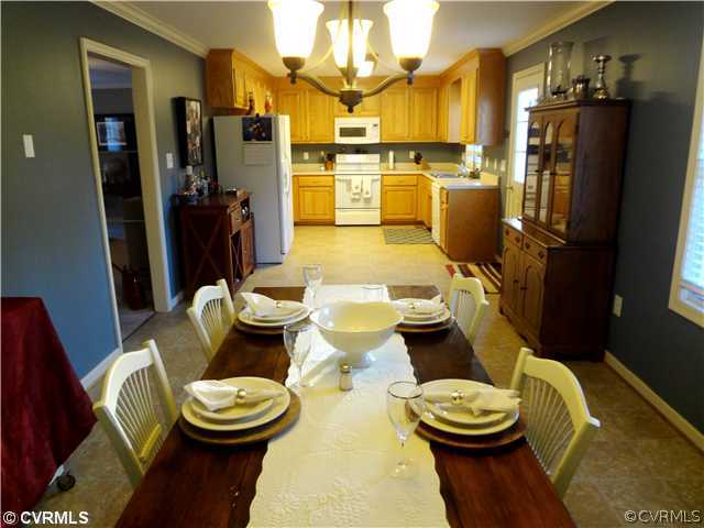 20310 Halligan Park Road Carson, VA 23830 - Photo 8 of 24 a dining room with furniture and wooden floor