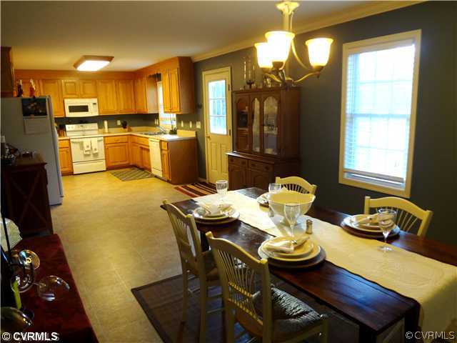 20310 Halligan Park Road Carson, VA 23830 - Photo 10 of 24 a view of a dining room with furniture and window