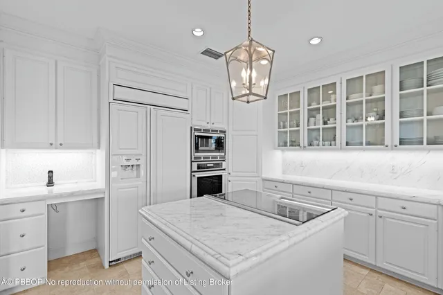 a building outdoor space with patio furniture and potted plants