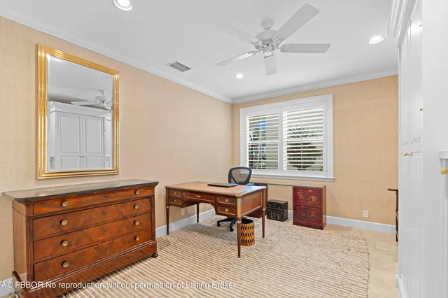 a view of a swimming pool with some plants and large trees