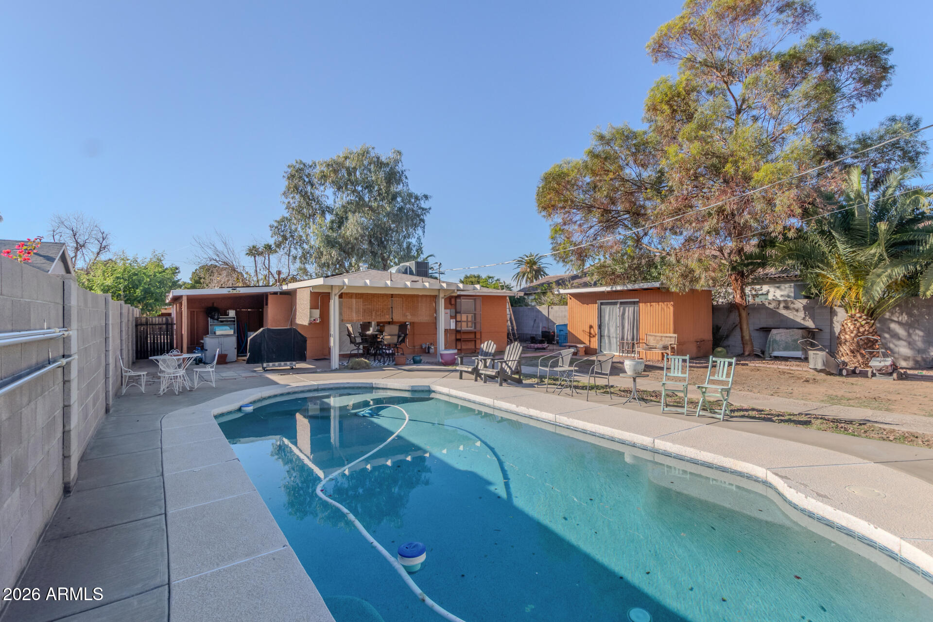 4413 North 19th Place Phoenix, AZ 85016 - Photo 13 of 14 a view of a house with backyard porch and sitting area