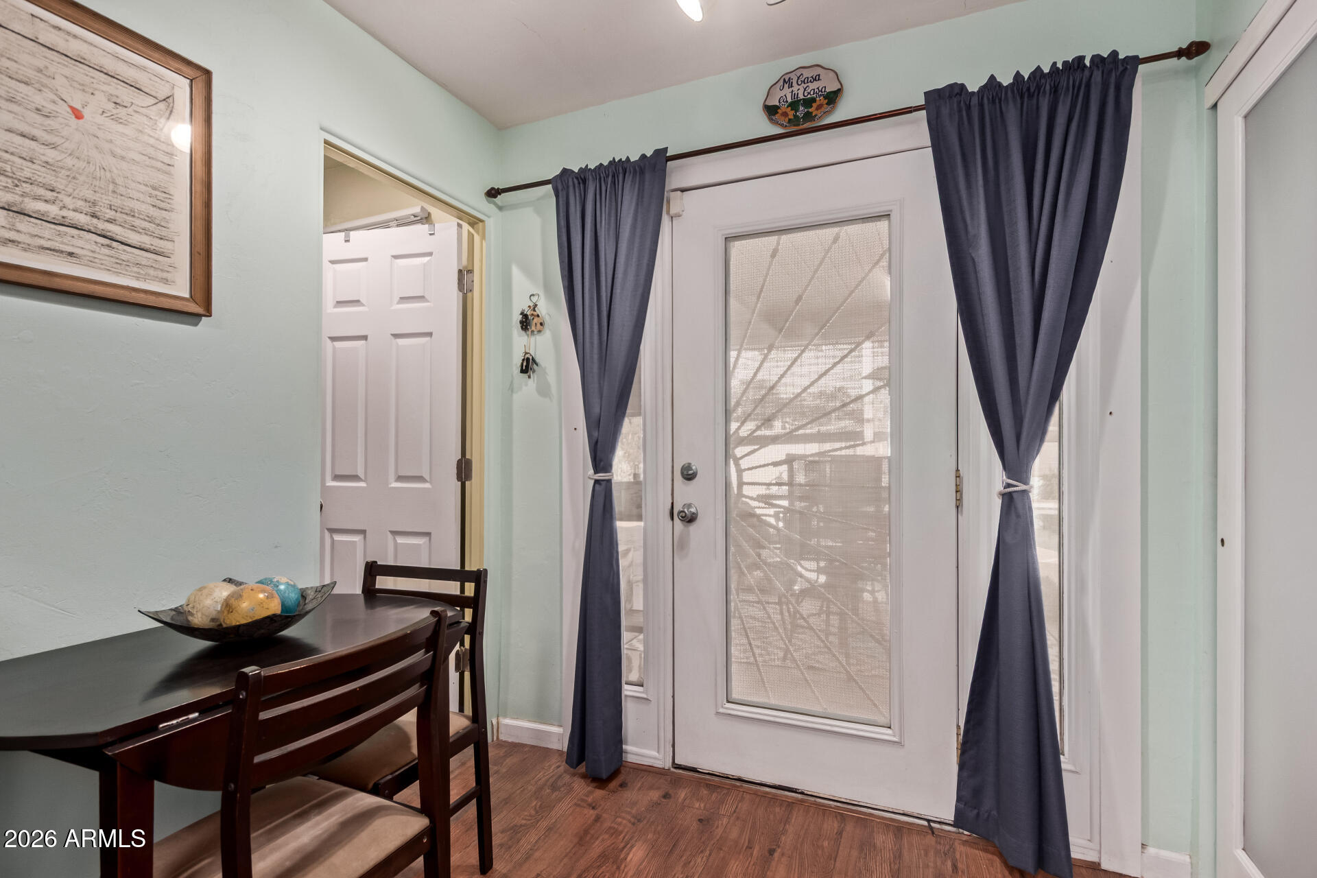 4413 North 19th Place Phoenix, AZ 85016 - Photo 4 of 14 a view of a livingroom with furniture and hardwood floor