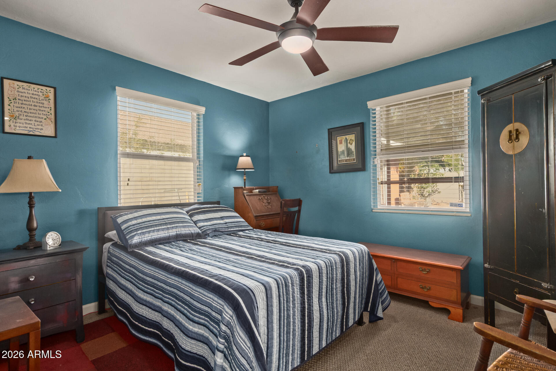 4413 North 19th Place Phoenix, AZ 85016 - Photo 7 of 14 a bedroom with a bed and a window
