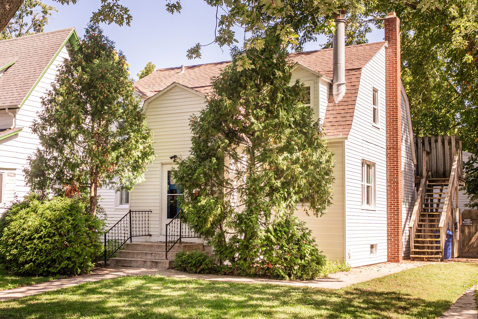 512 North 6th Street, Unit 2 DeKalb, IL 60115 - Photo 1 of 16 a view of a house with a yard