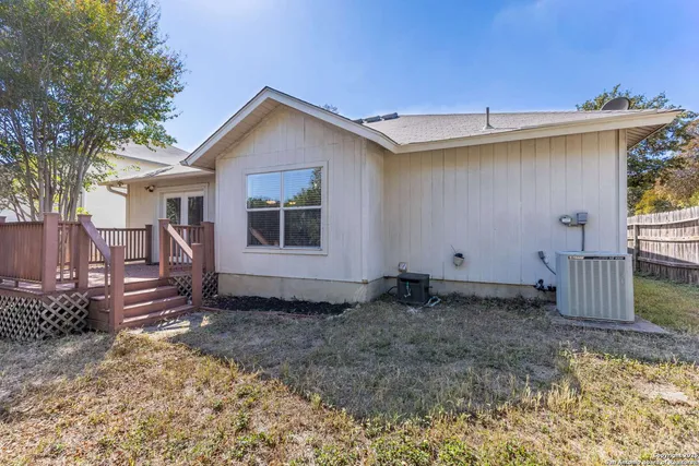 a house view with a backyard