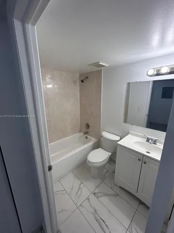 a view of a city with tall buildings