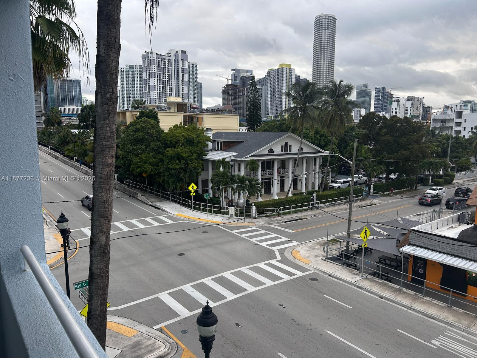 501 Southwest 1st Street, Unit 411 Miami, FL 33130 - Photo 18 of 18 a view of a city with tall buildings
