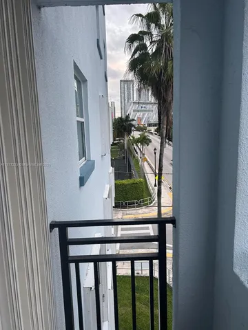 a bathroom with a toilet and a bathtub