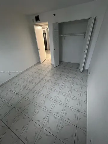 a bathroom with a toilet a sink and bathtub