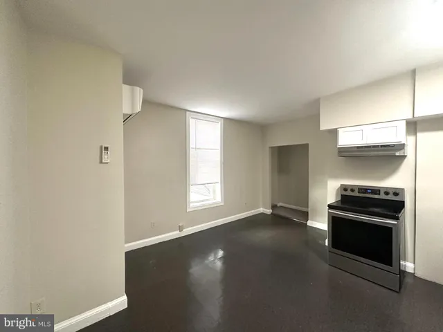 a bathroom with a bathtub and toilet