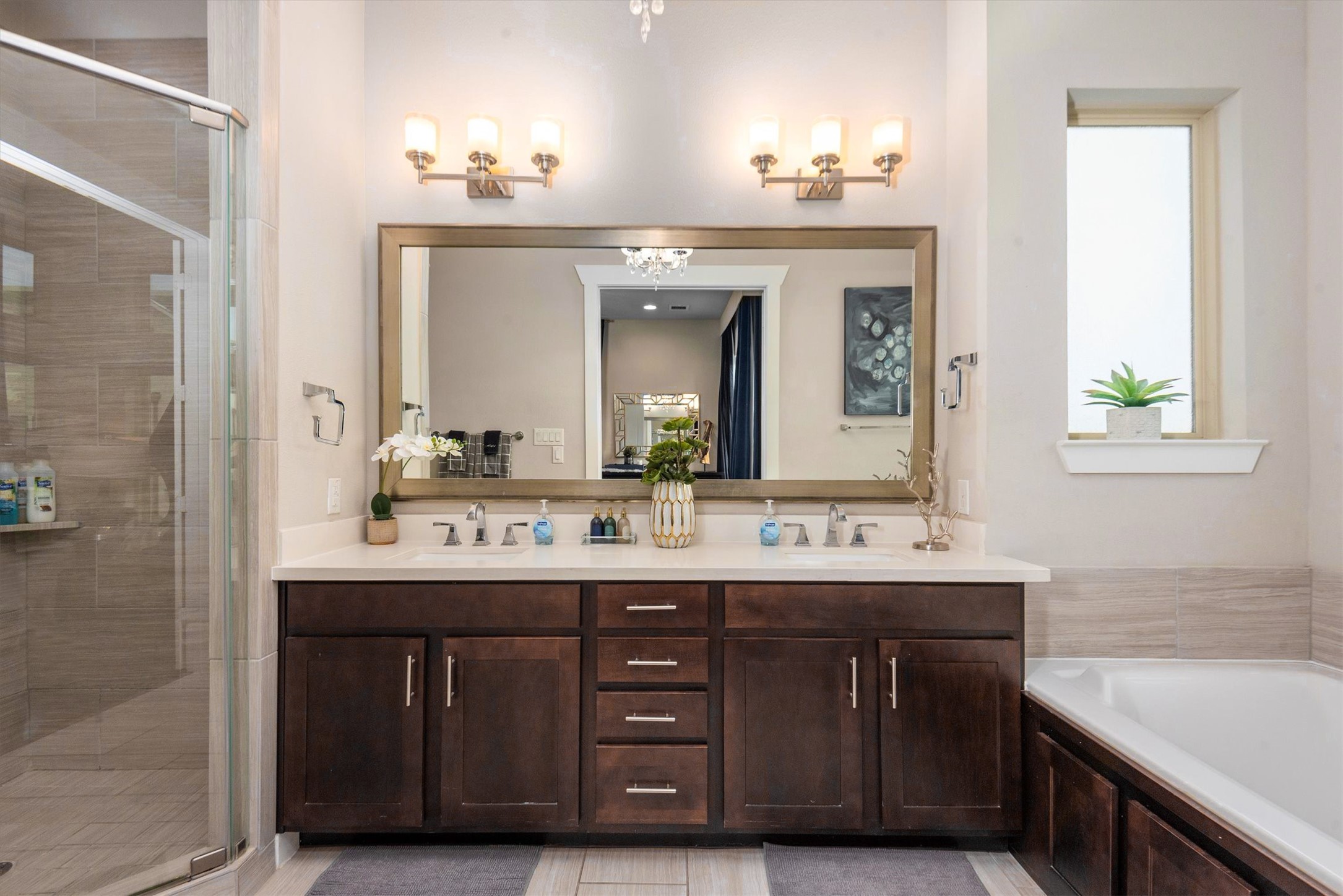 4413 Eli Street Houston, TX 77007 - Photo 26 of 47 a bathroom with a double vanity sink and a mirror