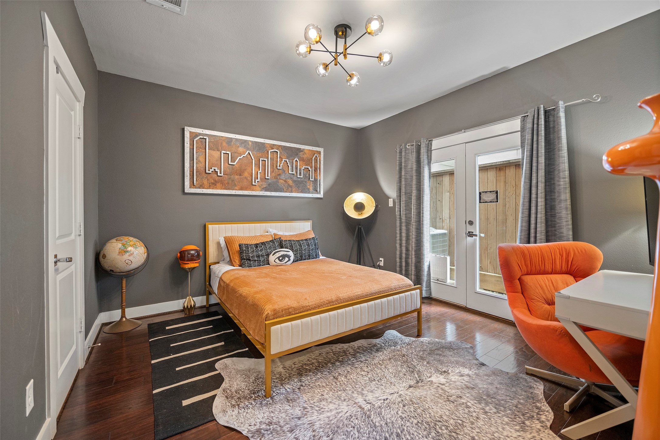 4413 Eli Street Houston, TX 77007 - Photo 33 of 47 a bedroom with bed and wooden floor