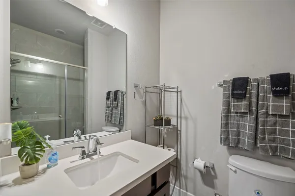 a view of a chairs and table in patio