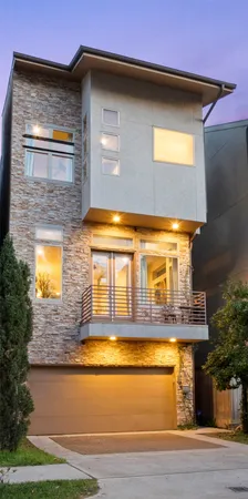 a kitchen with kitchen island a sink appliances and cabinets